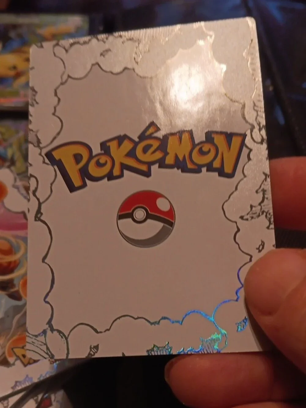 Pokemon Mimikyu Holographic Card - Silver with Orange Orbs